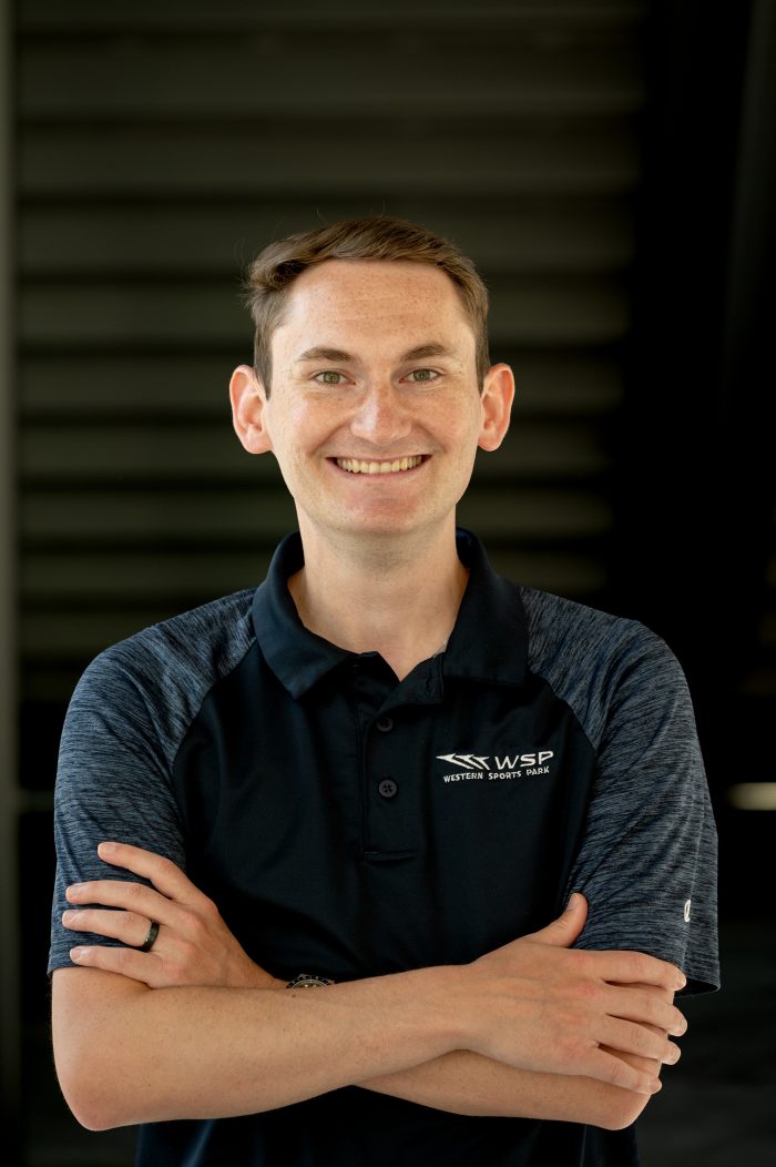 Braden Hacking Headshot Arms Crossed Meet the Team