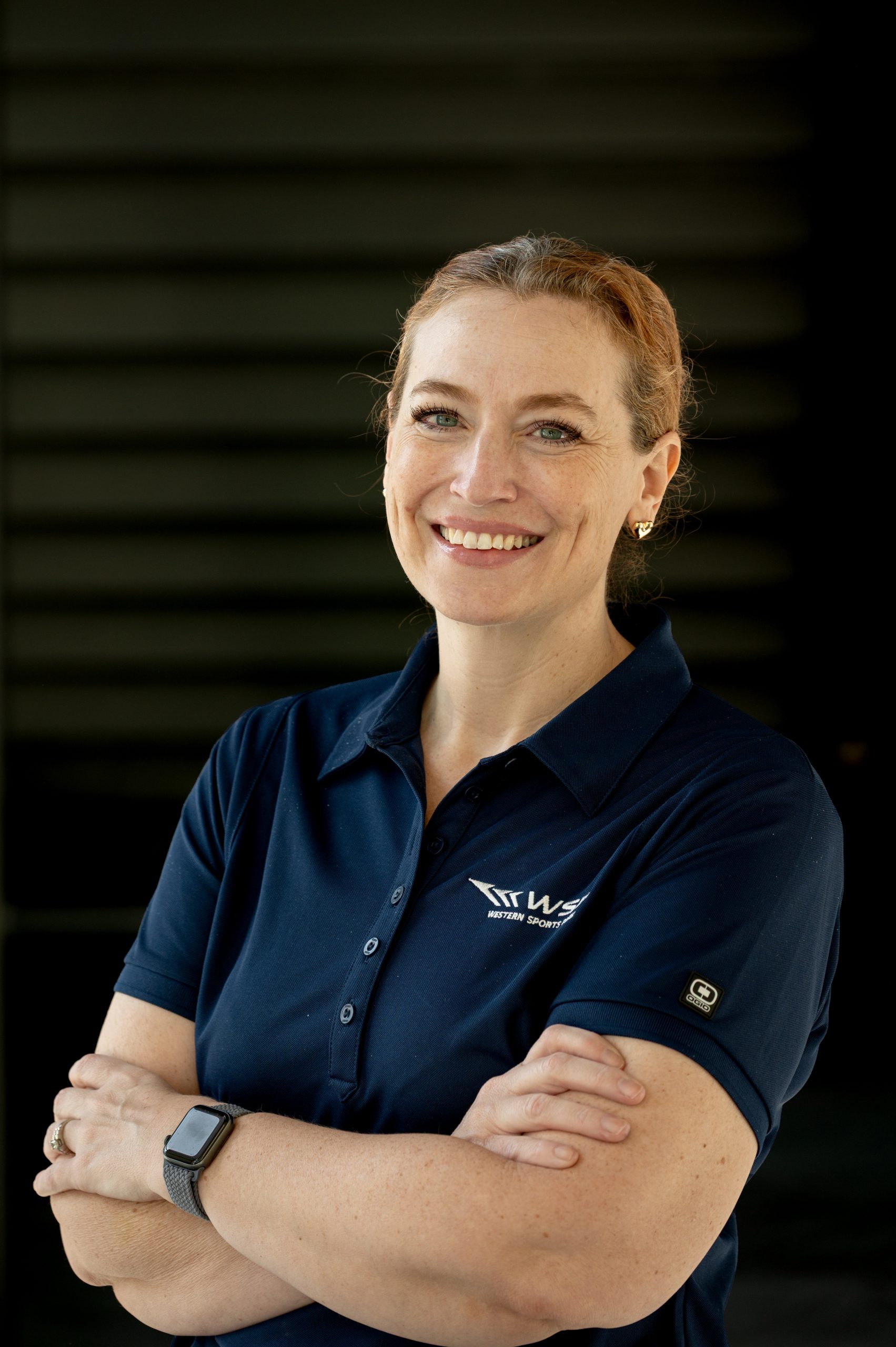 Kim Heaton Headshot Arms Crossed scaled Meet the Team